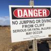 The State of Hawaii's advice on the matter. 
Despite these cautionary signs, they provide convenient 
concrete platforms from which to jump.